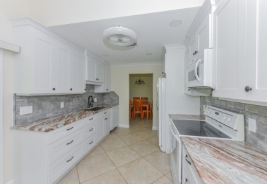 This spacious 3-bedroom, 2-bathroom home with a 2-car garage is on Heritage Ridge Golf Club in Florida - for sale on GolfHomes.com, golf home, golf lot