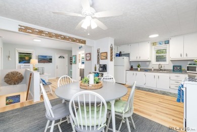 Experience lakefront living at its best in this beautiful on Tanglewood Shores Golf Club in Virginia - for sale on GolfHomes.com, golf home, golf lot