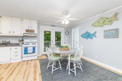 Experience lakefront living at its best in this beautiful on Tanglewood Shores Golf Club in Virginia - for sale on GolfHomes.com, golf home, golf lot