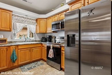 Pride of ownership truly shines in this beautifully maintained on Beaver Dam Resort in Arizona - for sale on GolfHomes.com, golf home, golf lot