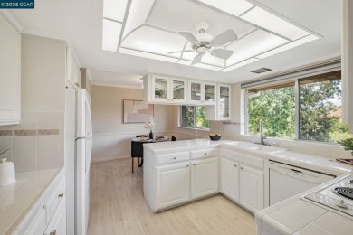 You'll love the two spacious balconies offering fantastic golf on Rossmoor Golf Course in California - for sale on GolfHomes.com, golf home, golf lot