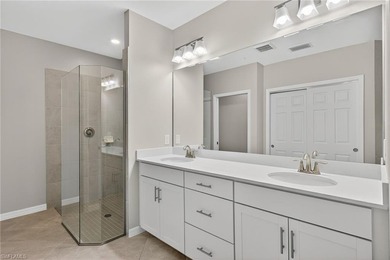 Experience serene resort-style living in this beautifully on Gateway Golf and Country Club in Florida - for sale on GolfHomes.com, golf home, golf lot