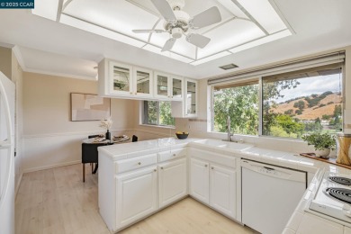 You'll love the two spacious balconies offering fantastic golf on Rossmoor Golf Course in California - for sale on GolfHomes.com, golf home, golf lot