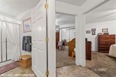 Pride of ownership truly shines in this beautifully maintained on Beaver Dam Resort in Arizona - for sale on GolfHomes.com, golf home, golf lot