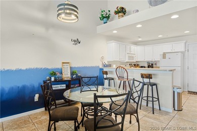 Top-floor 2BR, 2BA condo in the gated Cedar Heights overlooking on The Club At Old Kinderhook in Missouri - for sale on GolfHomes.com, golf home, golf lot