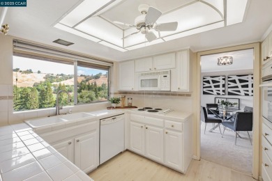 You'll love the two spacious balconies offering fantastic golf on Rossmoor Golf Course in California - for sale on GolfHomes.com, golf home, golf lot