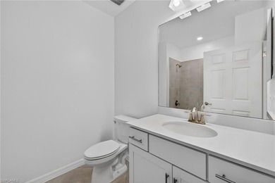 Experience serene resort-style living in this beautifully on Gateway Golf and Country Club in Florida - for sale on GolfHomes.com, golf home, golf lot