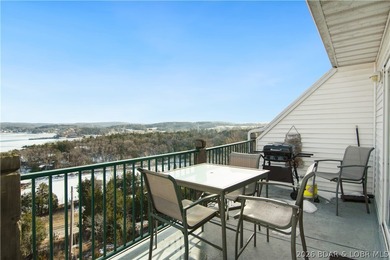 Top-floor 2BR, 2BA condo in the gated Cedar Heights overlooking on The Club At Old Kinderhook in Missouri - for sale on GolfHomes.com, golf home, golf lot