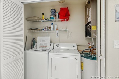 Top-floor 2BR, 2BA condo in the gated Cedar Heights overlooking on The Club At Old Kinderhook in Missouri - for sale on GolfHomes.com, golf home, golf lot