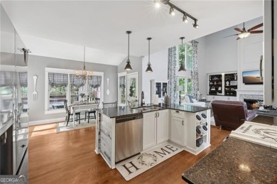 Welcome to 504 West Green Court-an exquisitely  renovated home on Towne Lake Hills Golf Club in Georgia - for sale on GolfHomes.com, golf home, golf lot