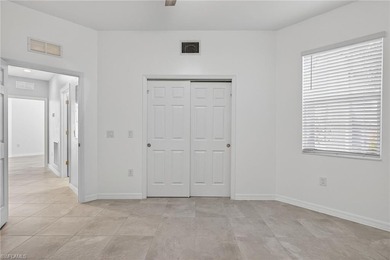 Experience serene resort-style living in this beautifully on Gateway Golf and Country Club in Florida - for sale on GolfHomes.com, golf home, golf lot