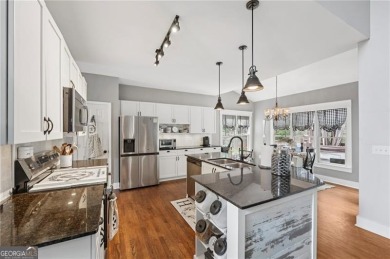 Welcome to 504 West Green Court-an exquisitely  renovated home on Towne Lake Hills Golf Club in Georgia - for sale on GolfHomes.com, golf home, golf lot