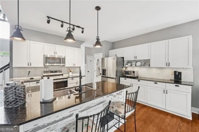 Welcome to 504 West Green Court-an exquisitely  renovated home on Towne Lake Hills Golf Club in Georgia - for sale on GolfHomes.com, golf home, golf lot