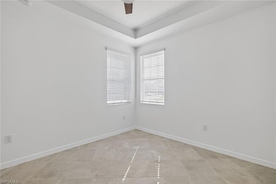 Experience serene resort-style living in this beautifully on Gateway Golf and Country Club in Florida - for sale on GolfHomes.com, golf home, golf lot