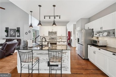 Welcome to 504 West Green Court-an exquisitely  renovated home on Towne Lake Hills Golf Club in Georgia - for sale on GolfHomes.com, golf home, golf lot