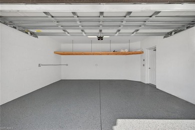 Experience serene resort-style living in this beautifully on Gateway Golf and Country Club in Florida - for sale on GolfHomes.com, golf home, golf lot