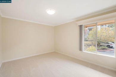 You'll love the two spacious balconies offering fantastic golf on Rossmoor Golf Course in California - for sale on GolfHomes.com, golf home, golf lot