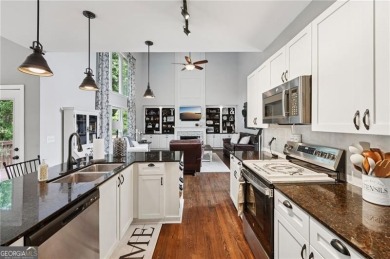 Welcome to 504 West Green Court-an exquisitely  renovated home on Towne Lake Hills Golf Club in Georgia - for sale on GolfHomes.com, golf home, golf lot
