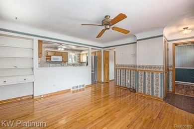 Situated at the end of a quiet cul-de-sac, this well-maintained on St. Clair Shores Country Club in Michigan - for sale on GolfHomes.com, golf home, golf lot