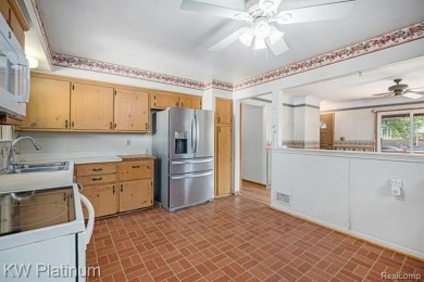 Situated at the end of a quiet cul-de-sac, this well-maintained on St. Clair Shores Country Club in Michigan - for sale on GolfHomes.com, golf home, golf lot