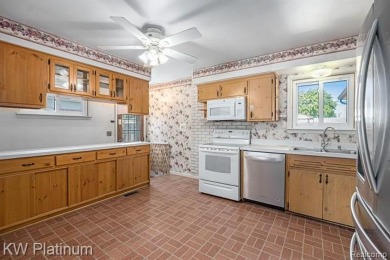 Situated at the end of a quiet cul-de-sac, this well-maintained on St. Clair Shores Country Club in Michigan - for sale on GolfHomes.com, golf home, golf lot