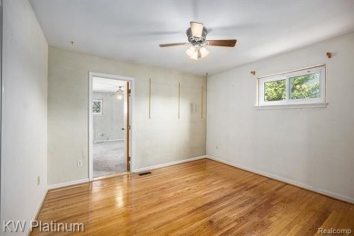 Situated at the end of a quiet cul-de-sac, this well-maintained on St. Clair Shores Country Club in Michigan - for sale on GolfHomes.com, golf home, golf lot