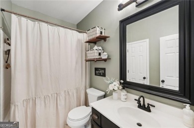 Welcome to 504 West Green Court-an exquisitely  renovated home on Towne Lake Hills Golf Club in Georgia - for sale on GolfHomes.com, golf home, golf lot