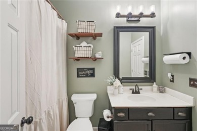 Welcome to 504 West Green Court-an exquisitely  renovated home on Towne Lake Hills Golf Club in Georgia - for sale on GolfHomes.com, golf home, golf lot