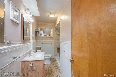 Situated at the end of a quiet cul-de-sac, this well-maintained on St. Clair Shores Country Club in Michigan - for sale on GolfHomes.com, golf home, golf lot
