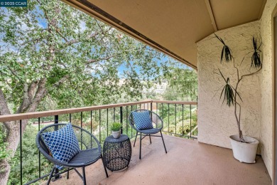 You'll love the two spacious balconies offering fantastic golf on Rossmoor Golf Course in California - for sale on GolfHomes.com, golf home, golf lot