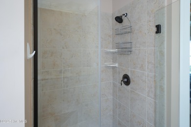 Everybody in the pool! Rare opportunity to purchase a house with on Members Club At St. James Plantation in North Carolina - for sale on GolfHomes.com, golf home, golf lot