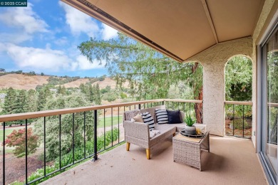 You'll love the two spacious balconies offering fantastic golf on Rossmoor Golf Course in California - for sale on GolfHomes.com, golf home, golf lot