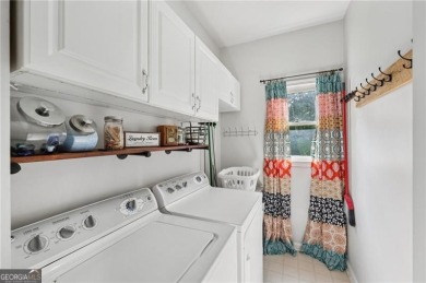 Welcome to 504 West Green Court-an exquisitely  renovated home on Towne Lake Hills Golf Club in Georgia - for sale on GolfHomes.com, golf home, golf lot
