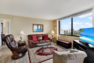 Discover your own slice of paradise in this beautiful 2-bedroom on Isla Del Sol Yacht and Country Club in Florida - for sale on GolfHomes.com, golf home, golf lot