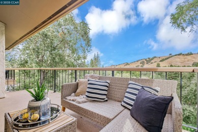You'll love the two spacious balconies offering fantastic golf on Rossmoor Golf Course in California - for sale on GolfHomes.com, golf home, golf lot