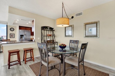 Discover your own slice of paradise in this beautiful 2-bedroom on Isla Del Sol Yacht and Country Club in Florida - for sale on GolfHomes.com, golf home, golf lot