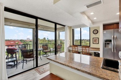 Discover your own slice of paradise in this beautiful 2-bedroom on Isla Del Sol Yacht and Country Club in Florida - for sale on GolfHomes.com, golf home, golf lot