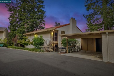 You'll love the two spacious balconies offering fantastic golf on Rossmoor Golf Course in California - for sale on GolfHomes.com, golf home, golf lot