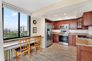 Discover your own slice of paradise in this beautiful 2-bedroom on Isla Del Sol Yacht and Country Club in Florida - for sale on GolfHomes.com, golf home, golf lot