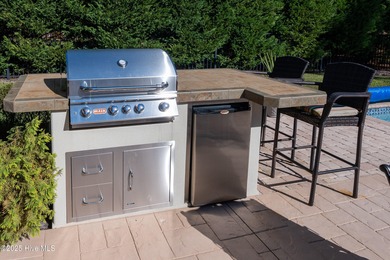 Everybody in the pool! Rare opportunity to purchase a house with on Members Club At St. James Plantation in North Carolina - for sale on GolfHomes.com, golf home, golf lot