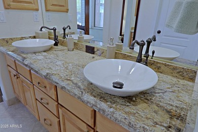 Sought-after Terreus model with a rare three-car garage in the on Terravita Golf and Country Club in Arizona - for sale on GolfHomes.com, golf home, golf lot