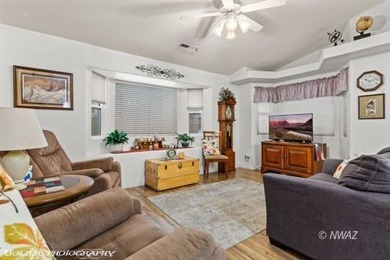 Pride of ownership truly shines in this beautifully maintained on Beaver Dam Resort in Arizona - for sale on GolfHomes.com, golf home, golf lot