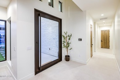 Modern luxury meets effortless desert living in this striking on London Bridge Golf Course in Arizona - for sale on GolfHomes.com, golf home, golf lot