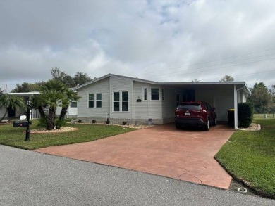 This beautifully maintained home is perfectly situated on a on Four Lakes Golf Club in Florida - for sale on GolfHomes.com, golf home, golf lot