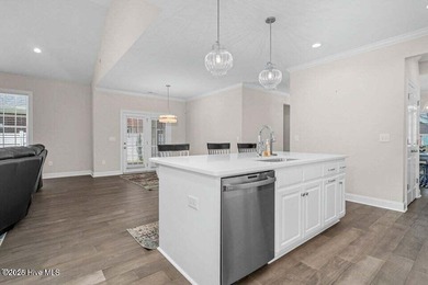 Step into easy one-level living in this 2023 carriage-style home on The Golf Club At Rocky Mount in North Carolina - for sale on GolfHomes.com, golf home, golf lot