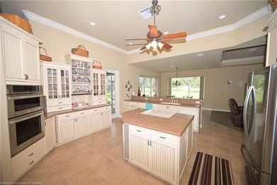 Check out this beautiful home overlooking the Deer Run Golf on  in Florida - for sale on GolfHomes.com, golf home, golf lot