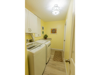 Embrace the ultimate Florida lifestyle in this 3/2/2 home on St. Lucie Trail Golf Club in Florida - for sale on GolfHomes.com, golf home, golf lot