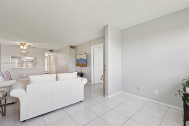 Welcome to this quiet, end unit on the 4th floor with on Sunrise Lakes Phase IV Golf Course in Florida - for sale on GolfHomes.com, golf home, golf lot