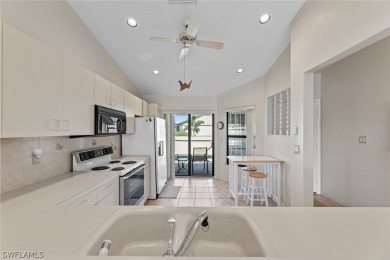 Welcome home to this canal front, one level condo in highly on Saint Andrews South Golf Club in Florida - for sale on GolfHomes.com, golf home, golf lot