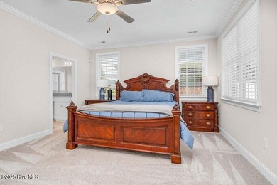 Step into easy one-level living in this 2023 carriage-style home on The Golf Club At Rocky Mount in North Carolina - for sale on GolfHomes.com, golf home, golf lot